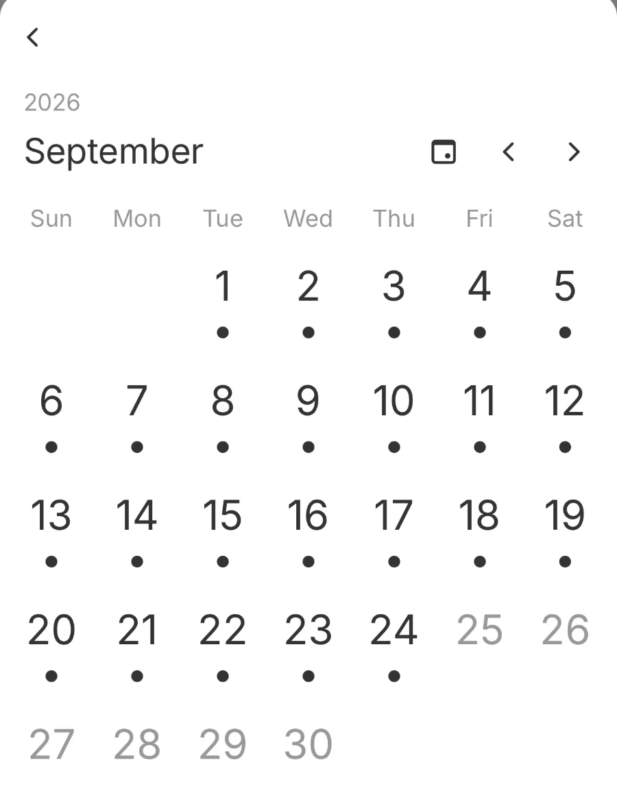 The Sesami storefront calendar in month view, with dots marking the days that have availability.